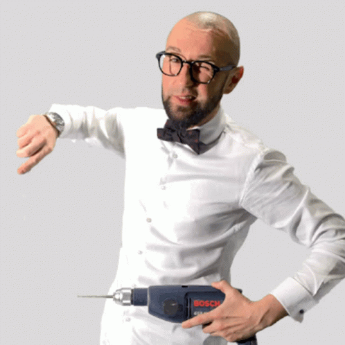 Man With Glasses And Bow Tie Holding Bosch Drill GIF