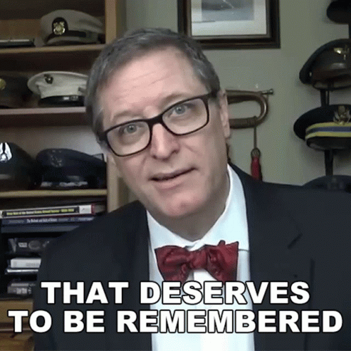 Man With Glasses And Bow Tie Saying That Deserves To Be Remembered GIF