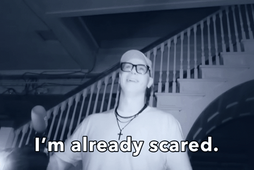 Man With Glasses and Cross Says I'm Already Scared