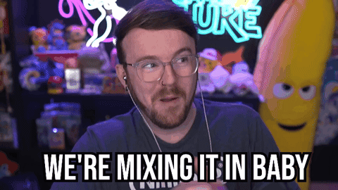 Man with Glasses and Earbuds Says We're Mixing It In Baby