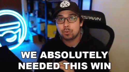 Man With Glasses and Hat Saying We Absolutely Needed This Win