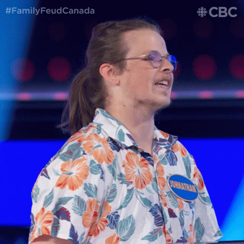 Man with Glasses and Hawaiian Shirt Name Tag Jonathan