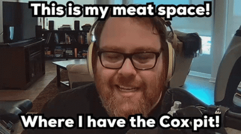 Man with Glasses and Headphones Says Meat Space