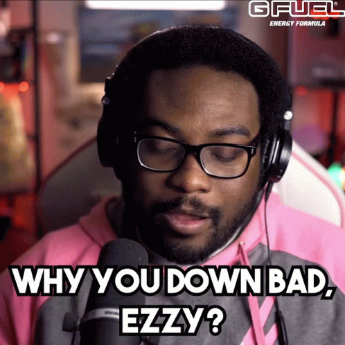Man With Glasses and Headphones Says Why You Down Bad Ezzy