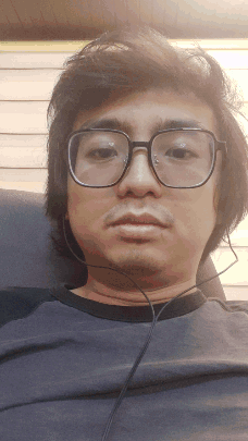 Man With Glasses And Headphones Sitting GIF