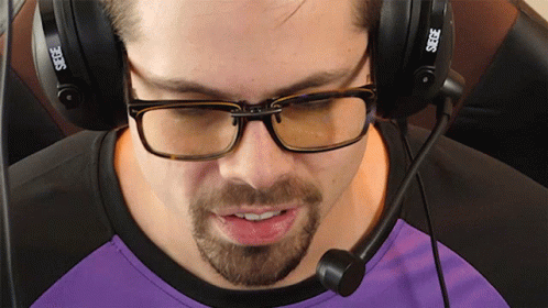 Man With Glasses and Headphones With Zeus