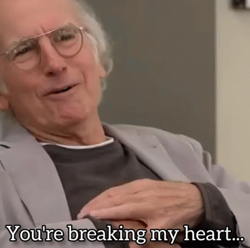 Man With Glasses and Jacket Saying You're Breaking My Heart