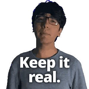 Man with Glasses and Keep It Real Shirt