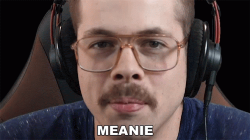 Man with Glasses and Moustache Says Meanie