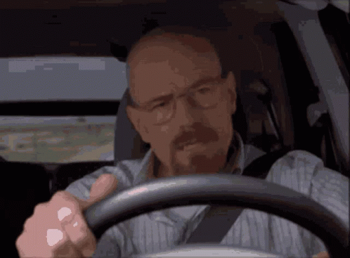Man With Glasses And Mustache Driving Car GIF