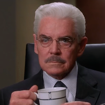 Man With Glasses And Mustache Holding Coffee GIF