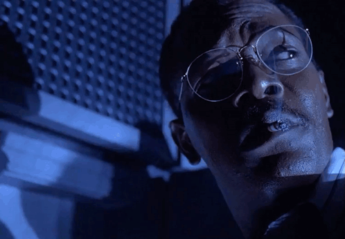 Man With Glasses and Mustache Saying Hold Onto Your Butts