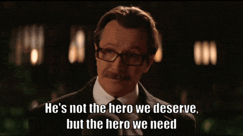 Man With Glasses and Mustache Says Not the Hero We Deserve