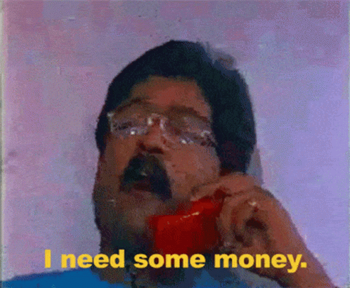 Man With Glasses and Mustache Talking on Red Phone Saying I Need Some Money