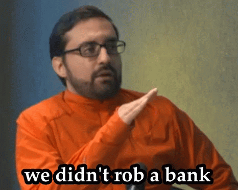 Man With Glasses and Orange Shirt Says We Didn't Rob a Bank