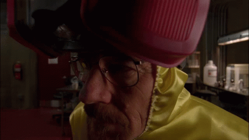 Man With Glasses and Pink Helmet Looking