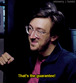 Man With Glasses And Pink Shirt Giving Middle Finger Saying That's The Guarantee GIF