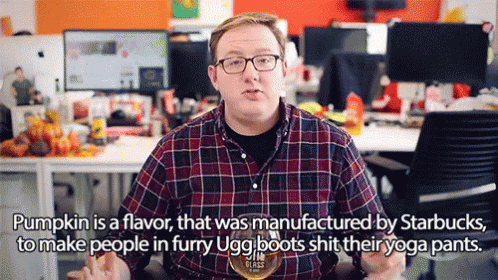 Man With Glasses and Plaid Shirt Talking About Pumpkin Flavor