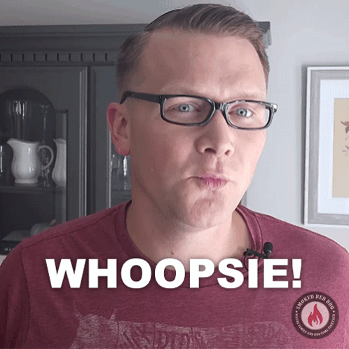 Man With Glasses and Red Shirt Saying Whoopsie