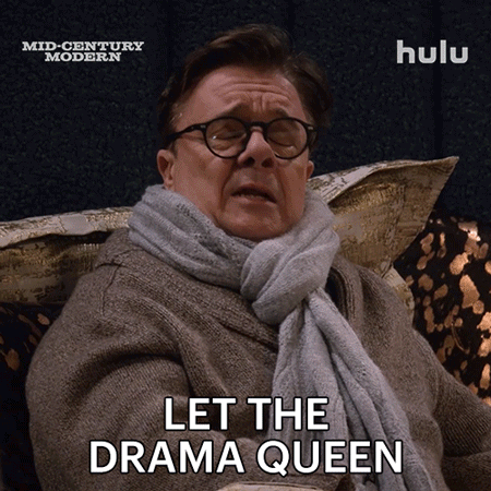Man with Glasses and Scarf Saying Let the Drama Queen
