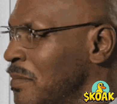 Man With Glasses And Skoak Logo GIF