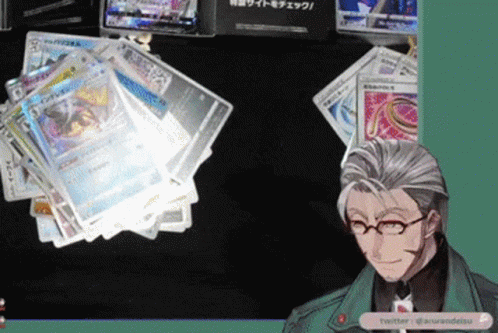 Man With Glasses and Stack of Cards