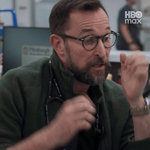Man with Glasses and Stethoscope in Green HBO Max Jacket