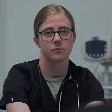 Man With Glasses And Stethoscope Looking At Camera GIF