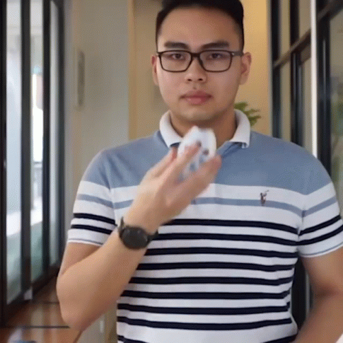 Man with Glasses and Striped Shirt