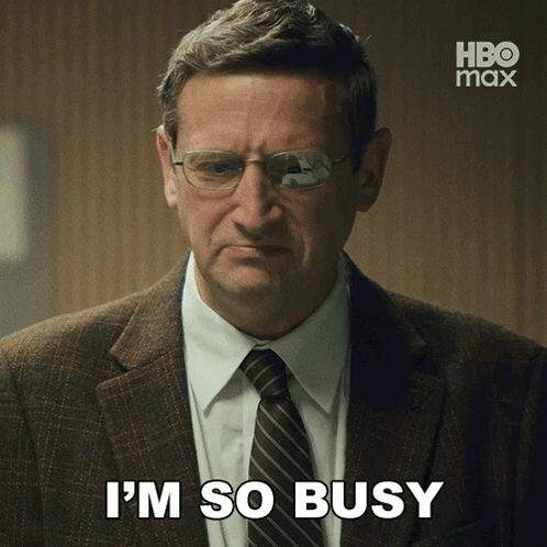 Man With Glasses and Suit I'm So Busy