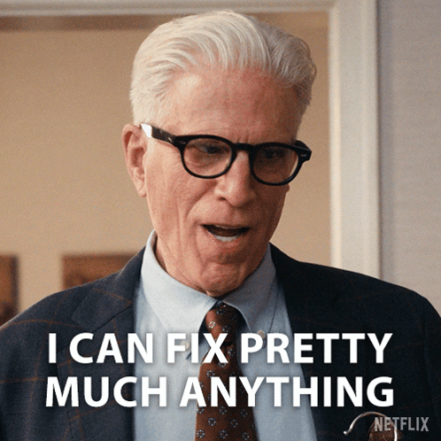 Man With Glasses and Suit Saying I Can Fix Pretty Much Anything