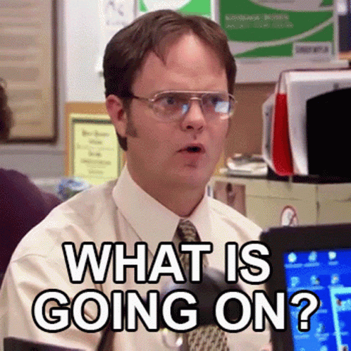 Man with Glasses and Tie Asking What's Going On