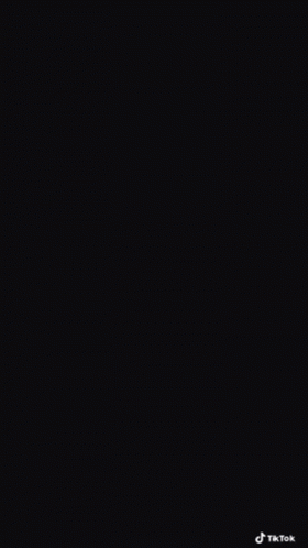 Man With Glasses And Watch Looking At Cell Phone GIF