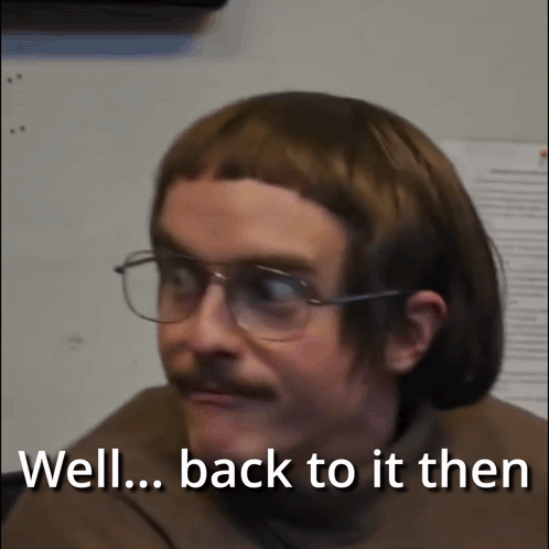 Man with Glasses and Wig Says Well Back To It