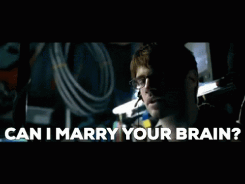 Man With Glasses Asking to Marry His Brain