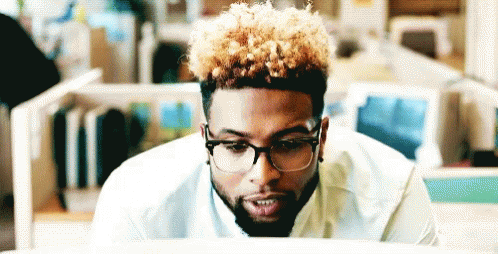 Man With Glasses at Computer
