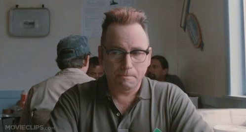Man With Glasses at Table