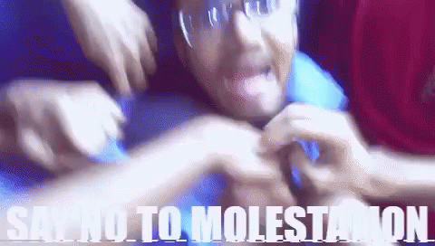 Man With Glasses Attacked by Group Saying Say No to Molestation