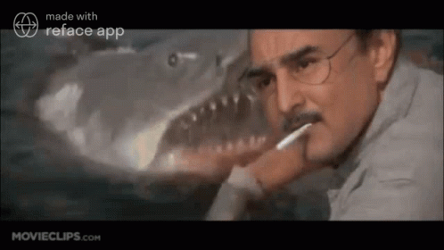 Man with Glasses Brushing Teeth by Shark in Water