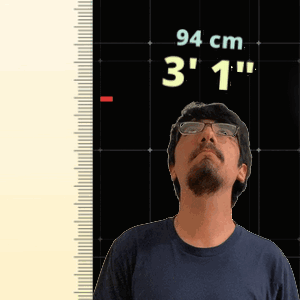 Man With Glasses by Ruler Saying 94 cm 3 1