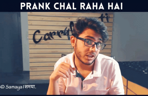 Man With Glasses By Wall Saying Carpet GIF