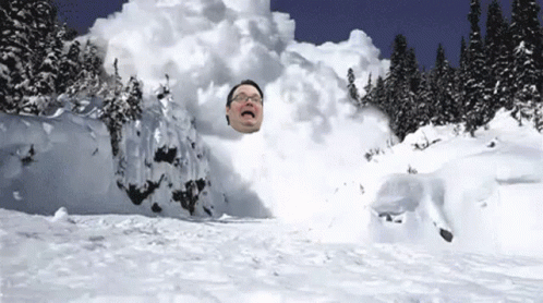 Man with Glasses Covered in Snow
