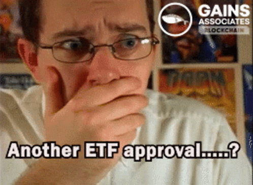Man With Glasses Covering Mouth Another ETF Approval