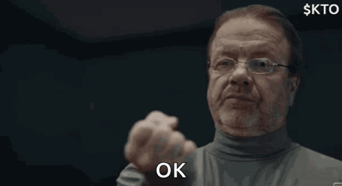 Man with Glasses Giving Thumbs Up