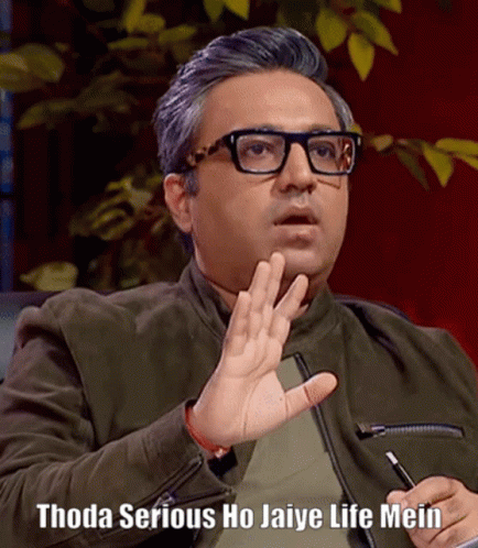 Man With Glasses Green Jacket Says Thoda Serious Ho Jaiye Life Mein GIF