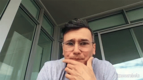 Man With Glasses Hand To Chin Bizness Rebels GIF
