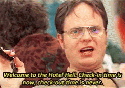 Man With Glasses Holding Key Welcome to Hotel Hell