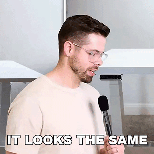 Man With Glasses Holding Microphone Says It Looks the Same