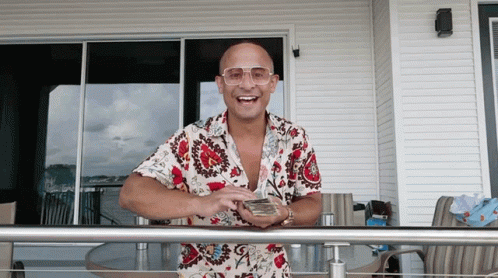 Man with Glasses Holding Money