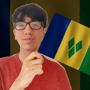 Man with Glasses Holding Small Flag